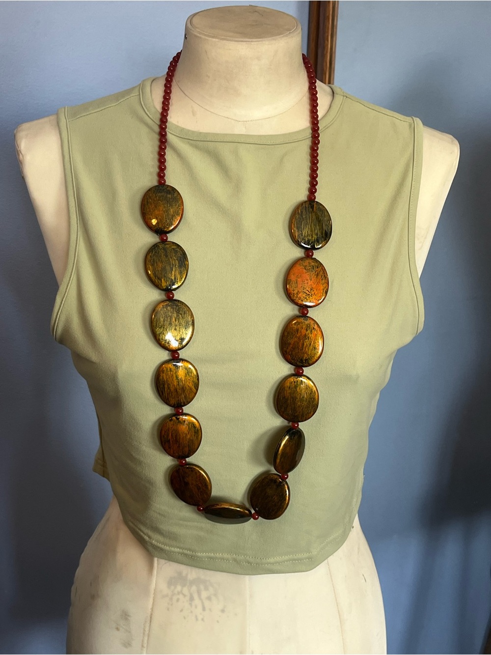 Long Wood Look Acrylic Bead Necklace with Small Red Acrylic Beads